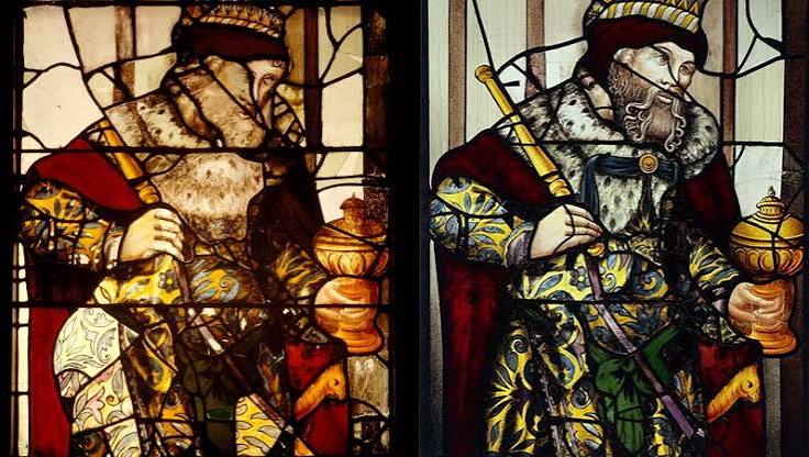 Two panels of medieval stained glass showing robed kings holding sceptres and gilded vessels, one weathered with age and one in full colour